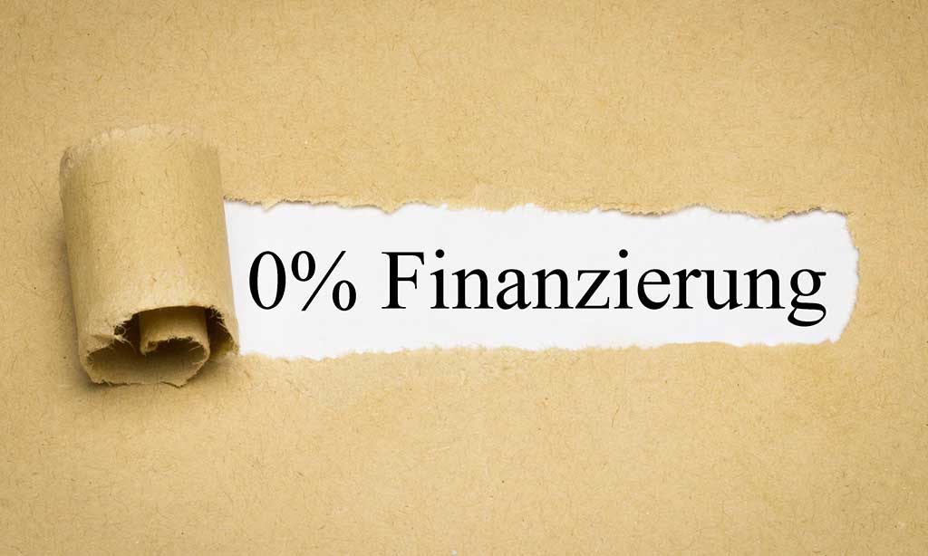 Auf beigem Recyclingpapier steht der Begriff « 0%-Finanzierung ».